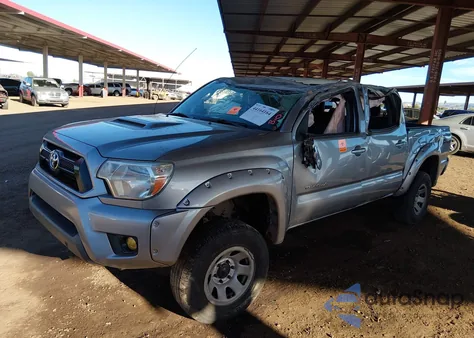2015 Toyota Tacoma Base V6 z USA, uszkodzony, nr VIN 3TMLU4ENXFM194684